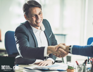 Temple Investor Shaking Hands with a Business Partner