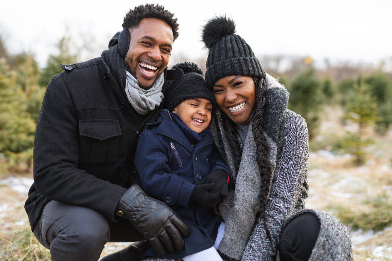 Happy Family Spending Time Outside During Winter