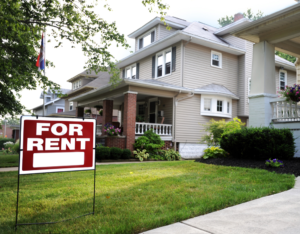 Booneville Rental Property with a For Rent Sign in the Front Yard