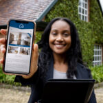 Woman using smartphone to contact her property manager about lease renewal options.