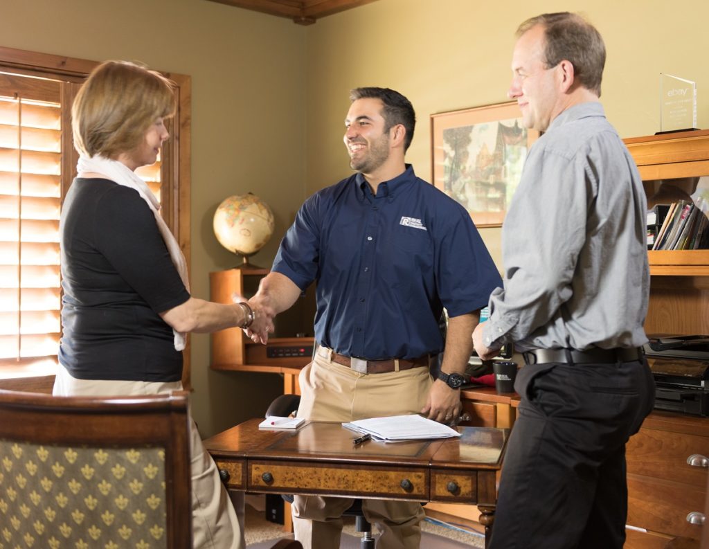 Columbia Property Manager Shaking the Hands of Satisfied Home owner