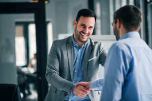 Man Shaking Hand with his Real Estate Partner