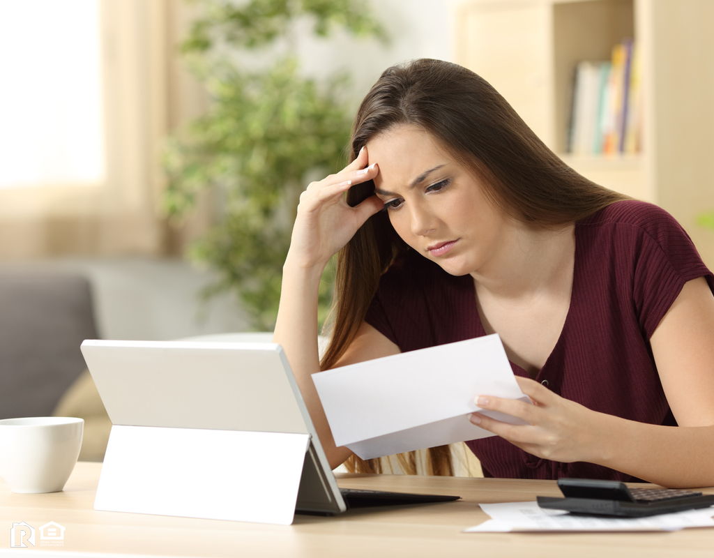 Frustrated Investor Looking at Paperwork