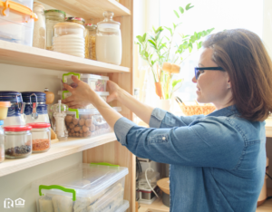 Elkins Tenant Organizing the Pantry in Their Kitchen