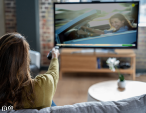Maize Tenant Relaxing at Home Watching Cable TV