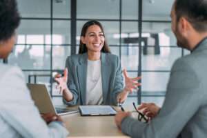 a business meeting with three people