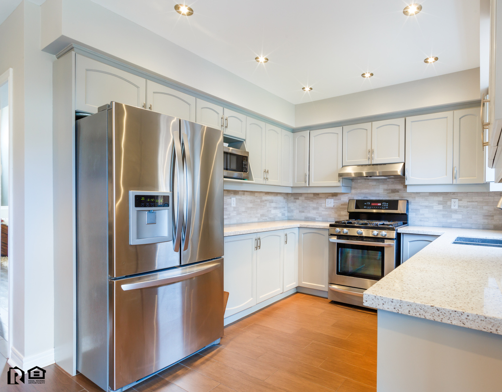 Stainless Steel Refrigerator in a Luxurious Kitchen
