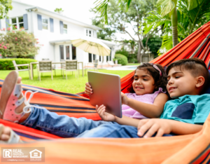 Keller Children in a Backyard Hammock