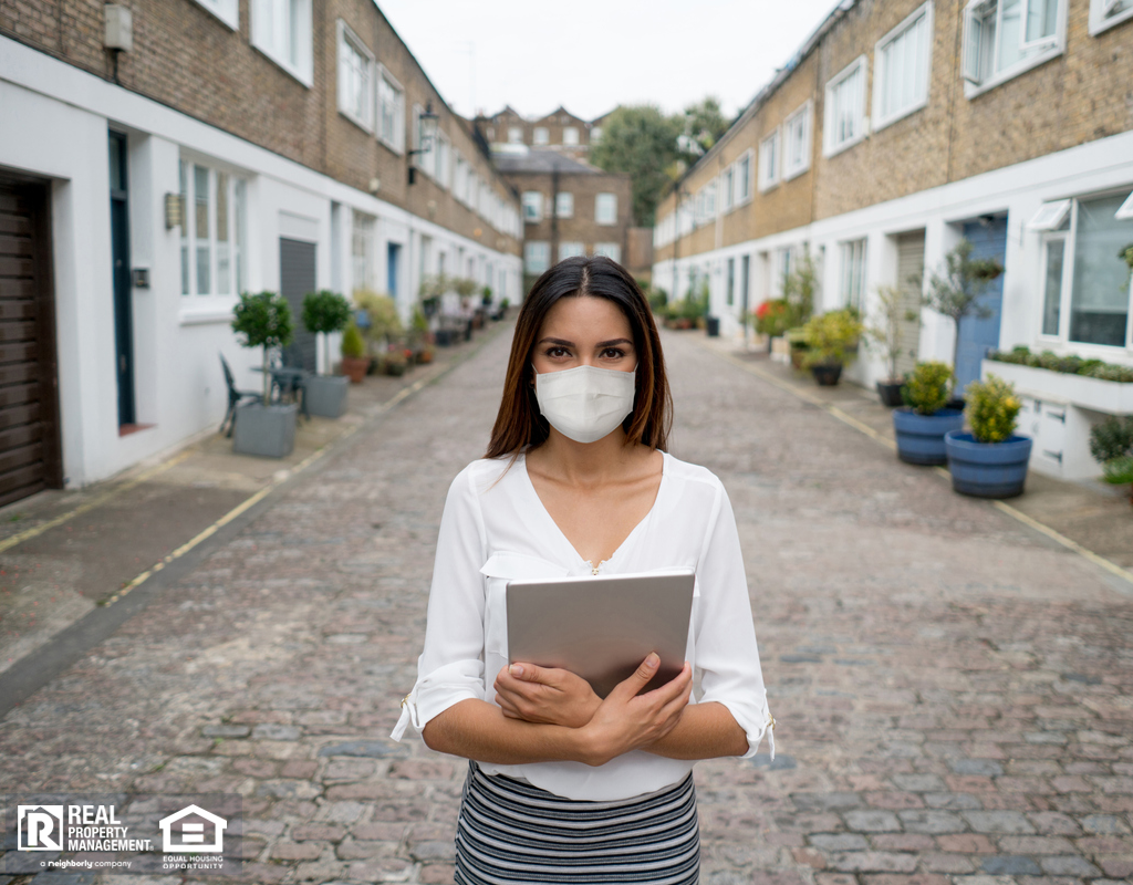 Cambridge Property Manager Wearing a Mask to Protect Against COVID19