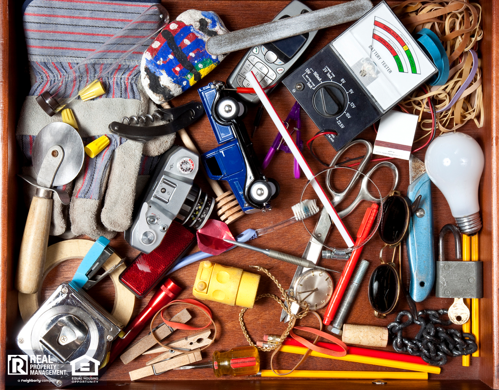 Birdseye View of a Messy Junk Drawer Full of Random Items