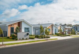 Row of single story newly developed houses.