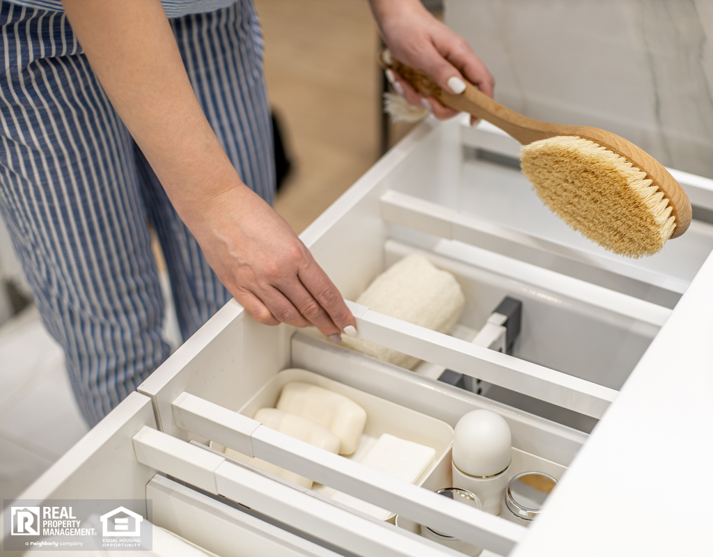 Round Rock Tenant Organizing Her Bathroom Drawers