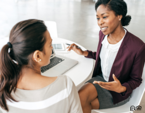 Two Business Women Making an Investment Decision