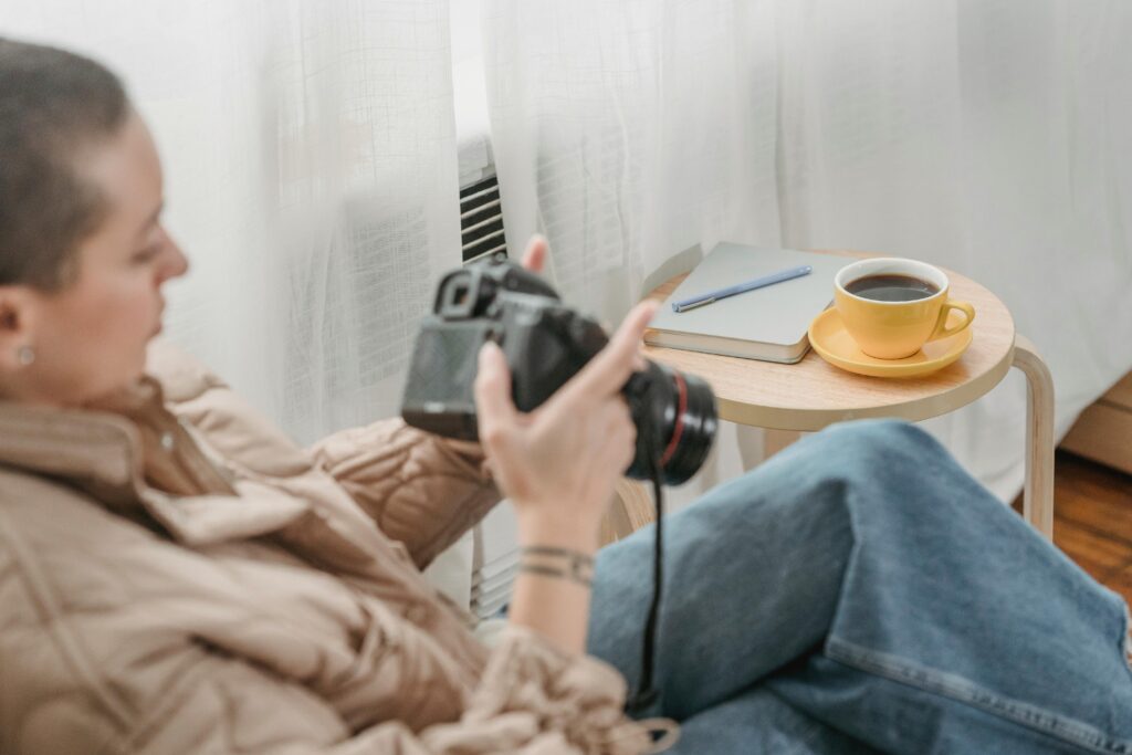 Photographer inside house with camera