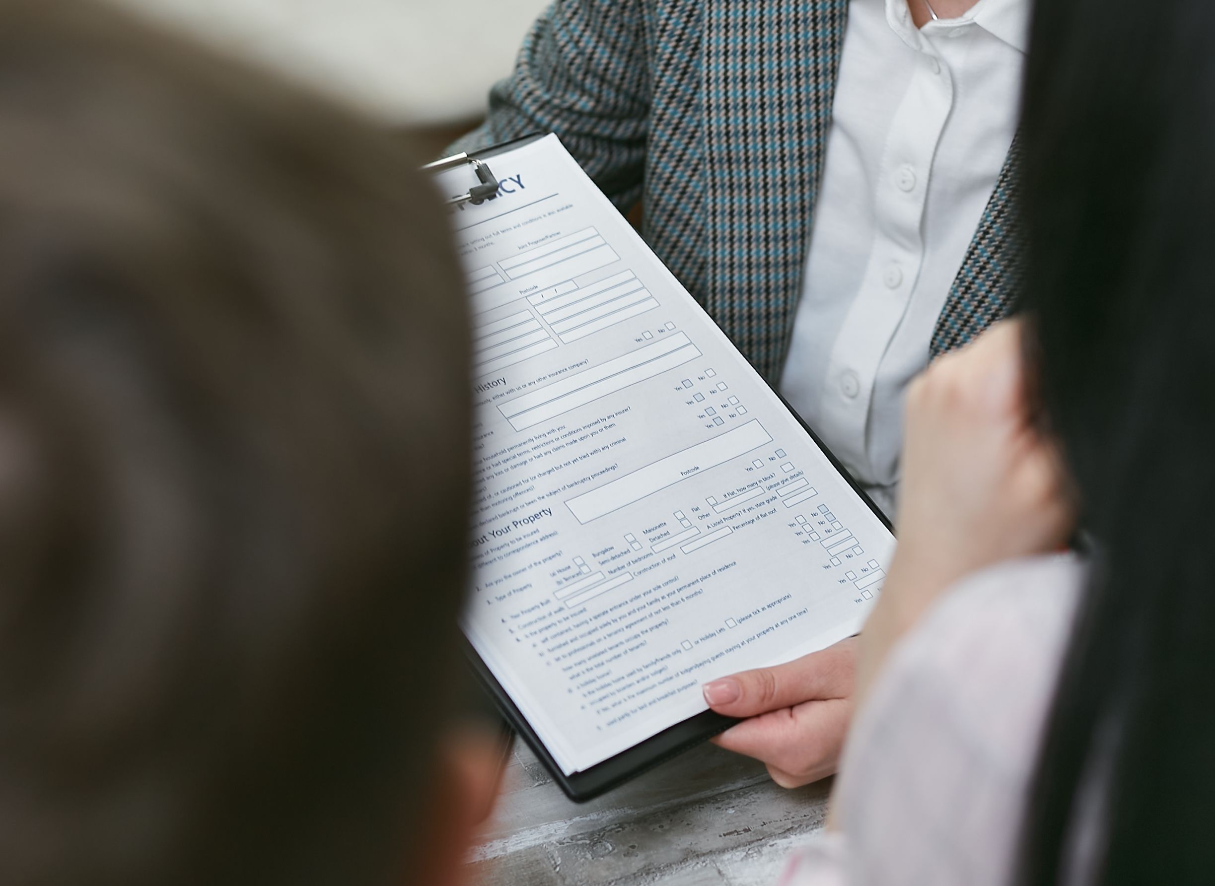 Close-up of discussing a legal contract