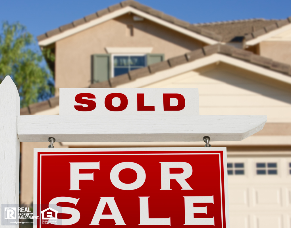 Round Rock Home with a “Sold” Sign in the Yard