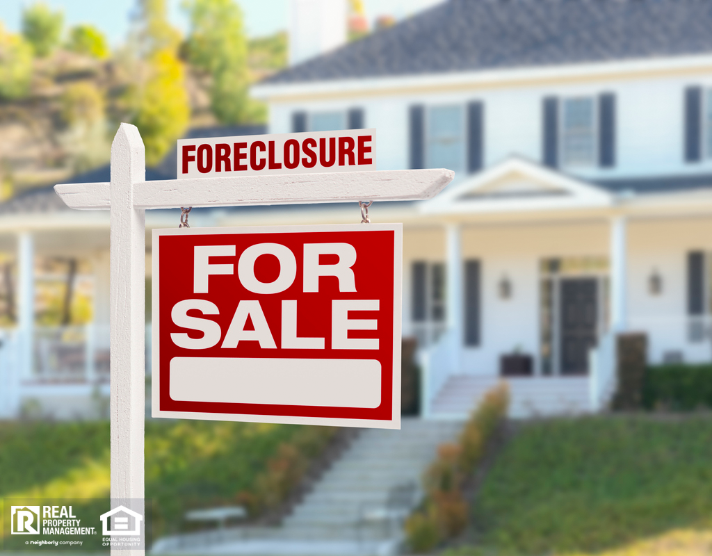 White Dallas House with Foreclosure Sign in Yard