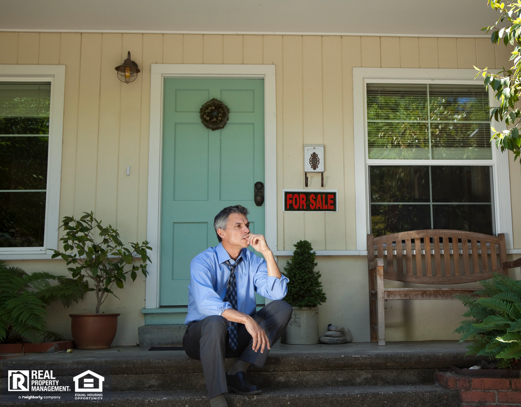 Suited Man Contemplating Real Estate Deal