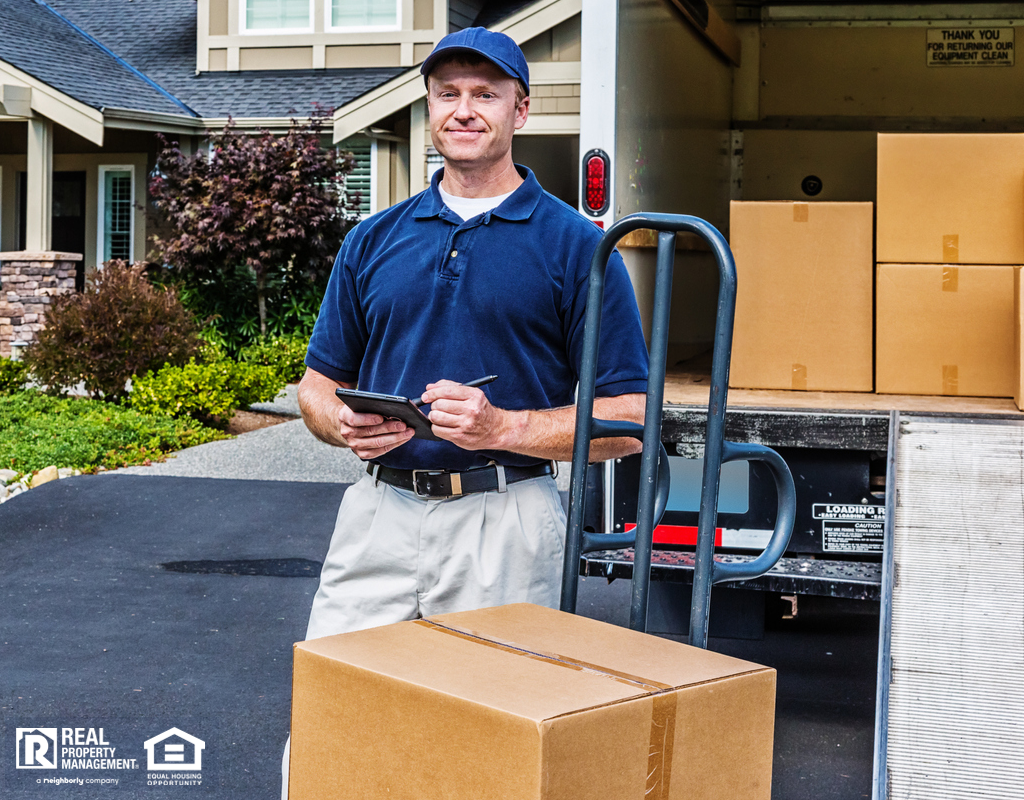 Mover Unpacking Van in Front of Laguna Hills Rental Home