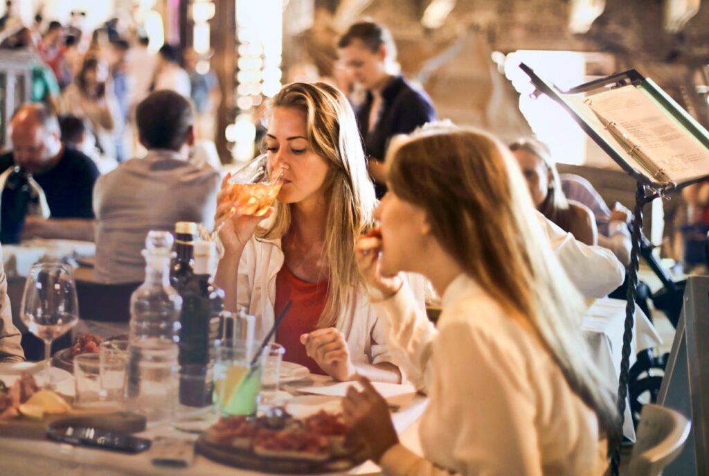 two people eating at a restaurant