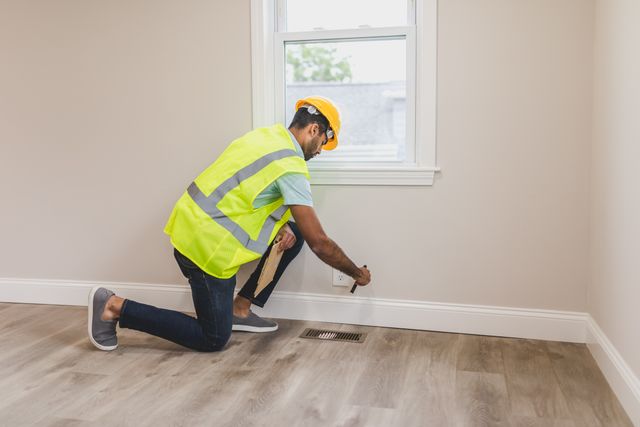 inspector checking household vents
