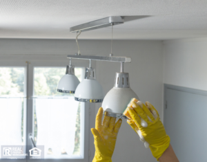 Tenant Cleaning Light Fixture in Clever Rental