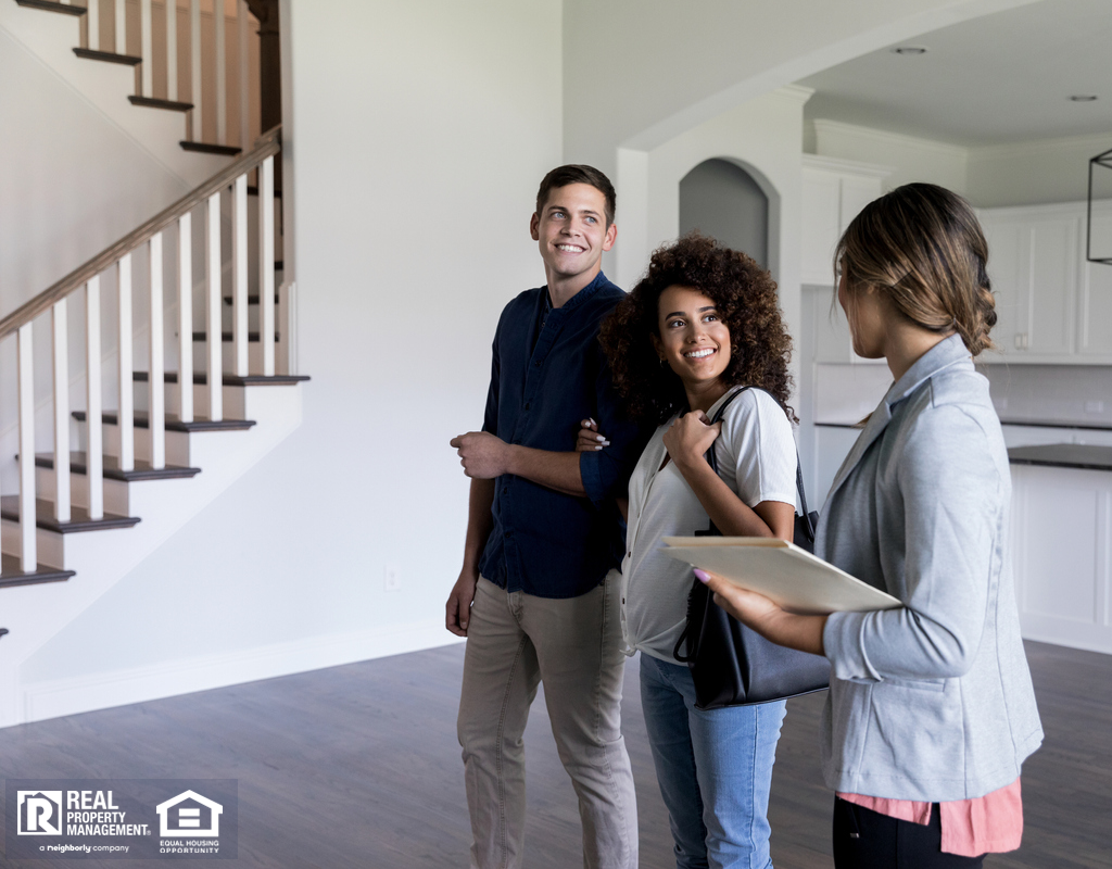 Potential Tenants Touring a Rental with Edmond Property Manager