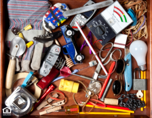 Birdseye View of a Messy Junk Drawer Full of Random Items
