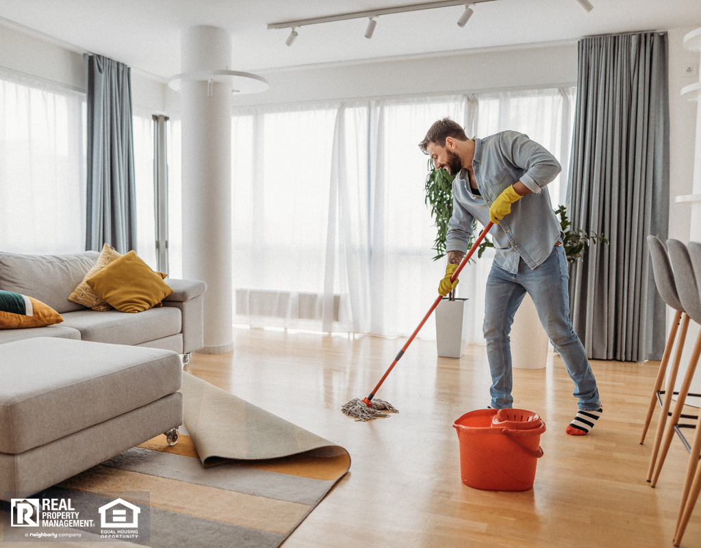 Roseville Renter Mopping with a String Mop