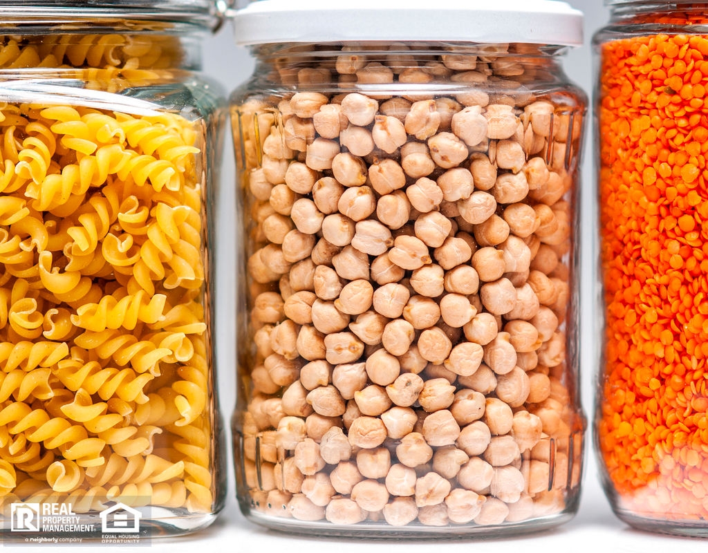 Three Cans of Noodles, Beans, and Lentils on a Shelf