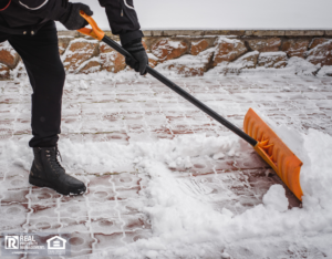 Grosse Pointe Tenant Shoveling Snow