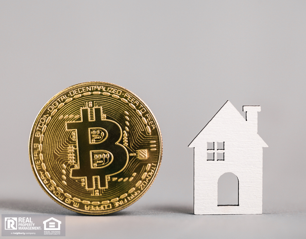 Golden Bitcoin Next to a Model House