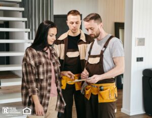 Renter and two plumbers going over their maintenance plan.