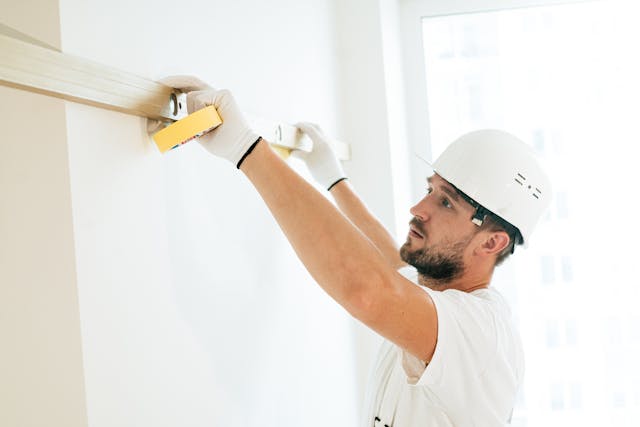 maintenance-man-measuring