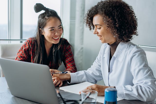two-woman-smiling-and-talking