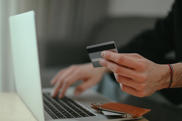 a person paying with a credit card
