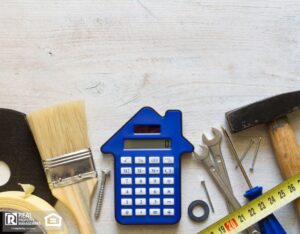 DIY tools and calculator on wooden white background.