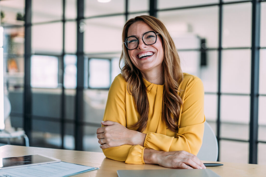 Confident businesswoman in modern office.