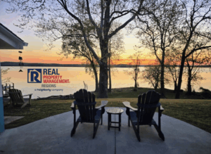 Sunrise over the Rappahannock River near Port Royal, Virginia, with warm light reflecting across the water and a quiet riverbank pier.