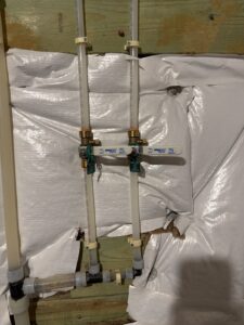 Winterized plumbing and shut-off valves protecting rental property infrastructure during freezing conditions