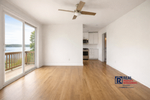 Waterfront rental home interior with hardwood floors and river views in Virginia Middle Peninsula