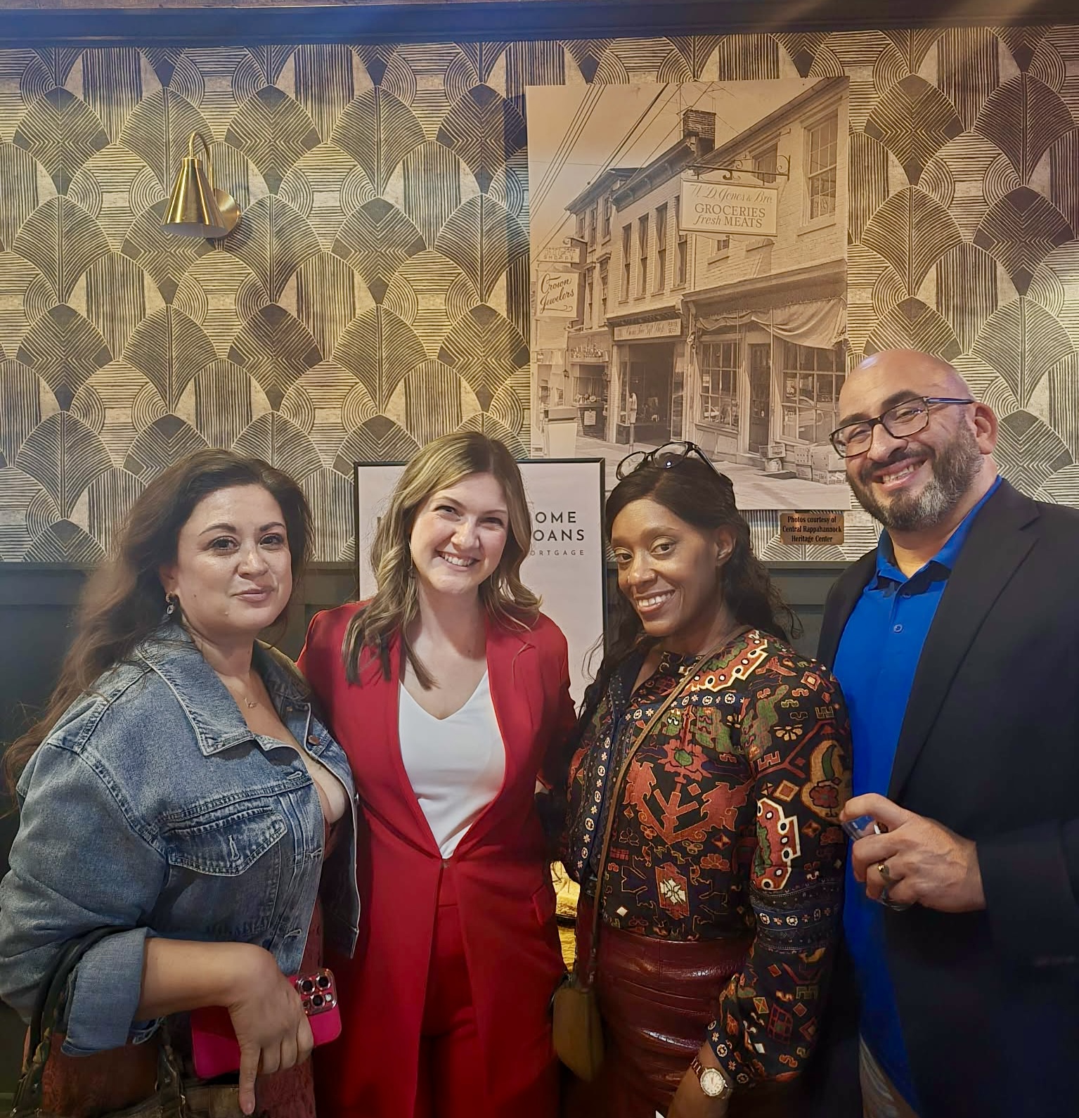 Katie at Lend It Home Loans branch launch event with local business professionals