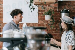 coffee-barista-talking-to-customer