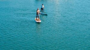 people-on-boards-in-water