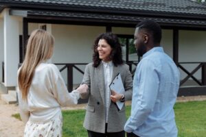 a landlord shaking hands with tenants