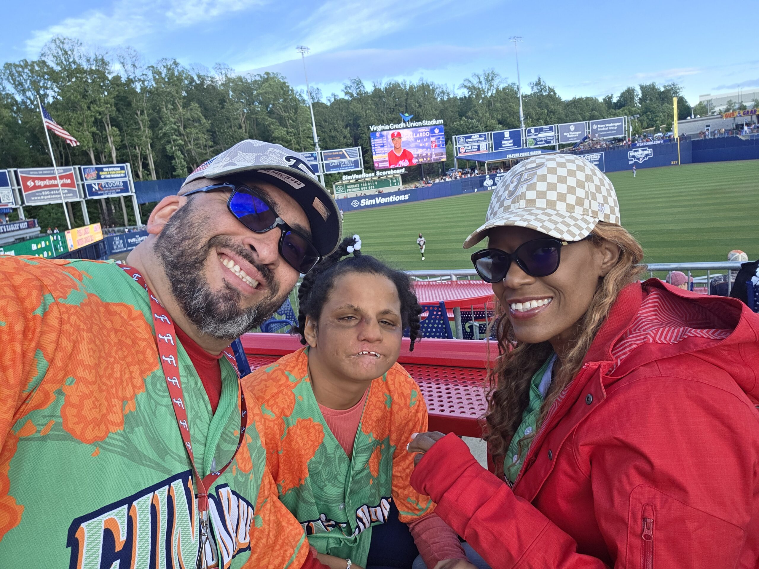 The Guasp family—Stephen, Phyllis, and their daughter Laila'h—sharing a moment together.