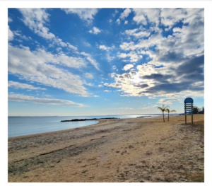 Colonial Beach waterfront in Virginia under a bright summer sky.