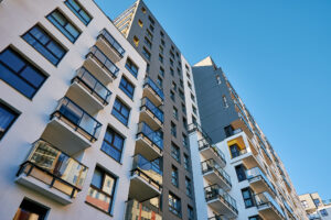 Modern city architecture. Residential house building facade with balconies.
