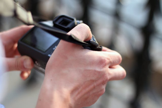 a person holding a camera