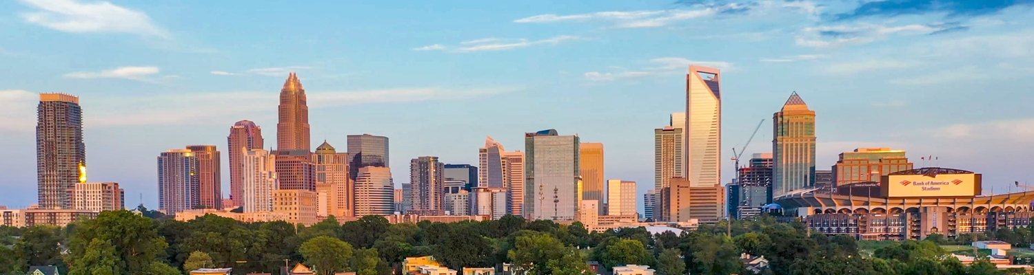 Local introductory image welcoming visitors to Real Property Management Queen City